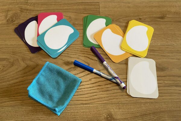 playful erasable play cards with markers and linen bag to bring the benefits of play